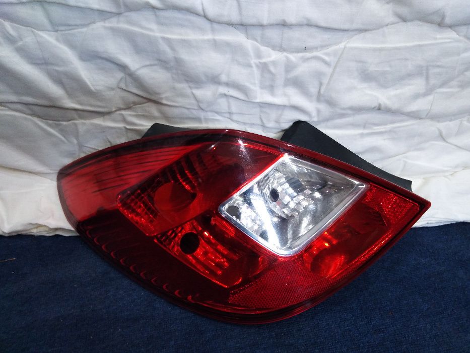 Opel Corsa D Lampa Lewy Tył ADAX Koźle